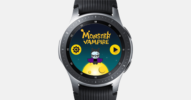 Screenshot of the Galaxy Watch with the Monster Vampire Game. Cute little monster with its wings stretched out on a yellow planet.