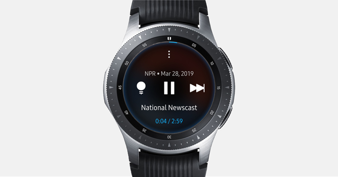 Screenshot of the Galaxy Watch with the NPR interface of the player showing pause button and general info.