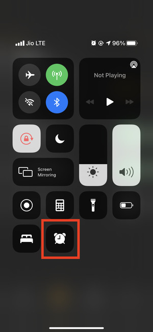 Alarm icon in Control Center on iPhone